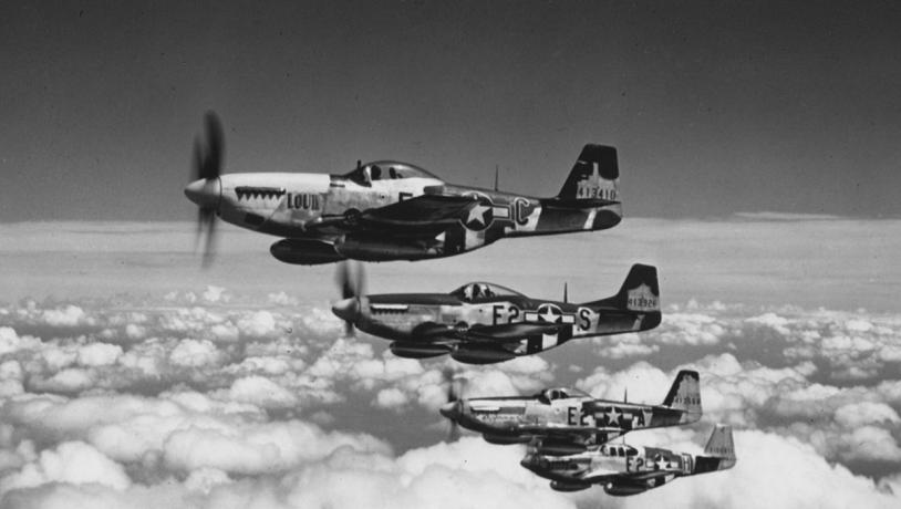 P-51 Mustang fighters heading home after successful mission over Europe
